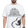 Male model wearing a white oversized T-shirt featuring “My Soul Speaks in Six Strings” typography and a black-and-white acoustic guitar graphic, paired with dark jeans and a black watch.