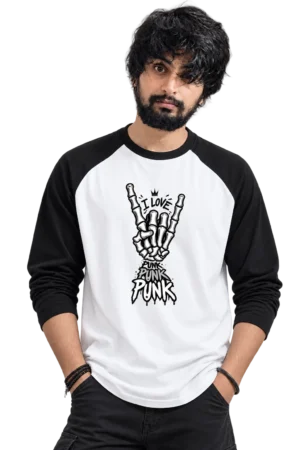 Young male model wearing a loose black and white raglan T-shirt featuring a skeleton hand punk graphic with “I LOVE PUNK” design